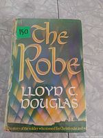 Front cover of The Robe showing title and author