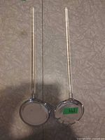 Two salad servers full view showing handles and heads