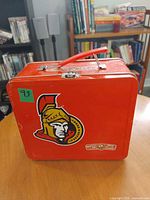 Front view showing Ottawa Senators logo and handle