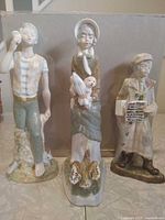 Front view of all three figurines