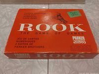 Front of orange Parker Brothers Rook box