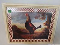 Front view of framed rooster artwork