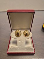 Earrings in presentation box front view