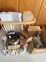 Group shot showing hat block, lamp base, cords, steamer box, plastic panels