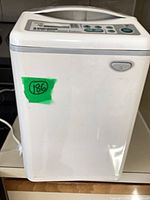 Front and side view of breadmaker showing overall condition and attached power cord