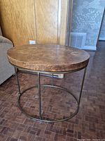 Full view of round burl wood accent table