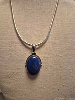 Front view of necklace on display form