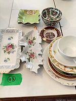 Group view of all porcelain pieces on table