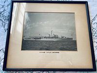 Front view of framed photograph showing HMS Wild Goose image, frame and mat