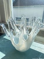 Full view of Murano splash vase on windowsill