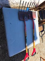 Full view of both 3-in-1 pitchforks on table