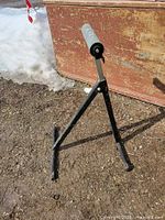 front view of steel roller stand showing frame and roller