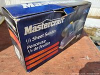 Closed retail box showing branding and model info