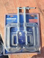 Front view of sealed Mastercraft 4-pc C-clamp set showing both clamp sizes