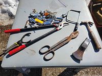Overall view of tools and hardware on table