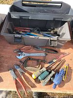 Overall view of toolbox open with assorted tools visible
