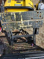 Top view of Black & Decker Workmate 225 showing branding, measurement scale and wear