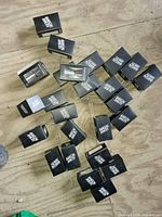 Group of boxed Barrelling Annie Rye double jiggers on floor