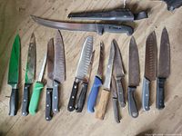 Overview of all fourteen knives laid out