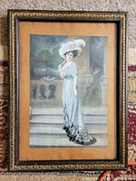 Front view of framed lithograph showing artwork and frame