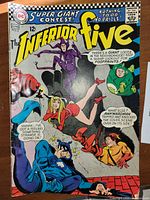 Front cover showing title, characters, issue number, price