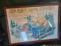 Front view of framed cartoon drawing with visible title and scene