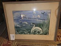 Front view of framed painting with mat and frame visible