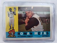 Front of 1960 Topps Roman Mejias card in sleeve