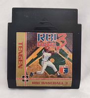 Front view of R.B.I. Baseball 3 NES cartridge showing label