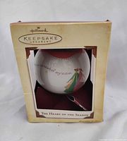 Front view of boxed Hallmark Keepsake Ornament showing title and ornament design