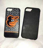 Front of both iPhone 6 cases, Orioles graphic and black textured