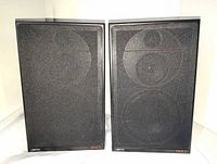 Front view of both Jamo Magic 6 speakers with grilles on