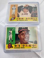 Fronts of both cards in sleeves