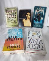 Front view of all five sealed cassette boxes