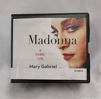 Front view of binder showing title, author, disc count