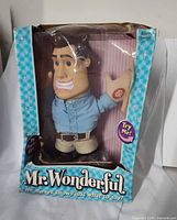 Front view of boxed Mr. Wonderful doll