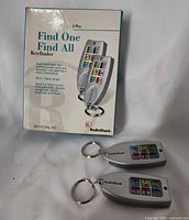 Front view of box and two keyfinder fobs