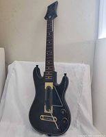 front view of Guitar Hero Live controller