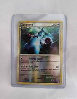 Front of sleeved Zangoose card showing artwork, HP 80, attacks and set info