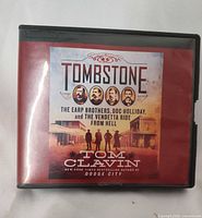 Front of clamshell case showing Tombstone cover art and author information
