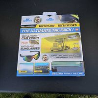 Retail box showing Bell + Howell Ultimate Tac Pack detailing TacVisor and missing TacGlasses