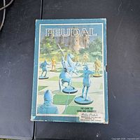 Box lid showing Feudal artwork and title