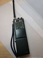 Full view of ICOM IC-M5 radio with antenna and wrist strap