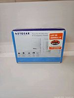 Front of sealed retail box showing Netgear Powerline AV 200 Ultra Adapter Kit