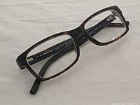 Front angle of Burberry BE2108 eyeglasses showing rectangular lenses and black frame front