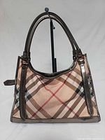 Front view of Burberry Supernova Check Ashmore tote showing overall design and condition