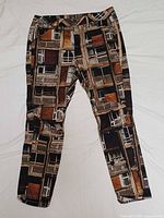 Jeans front view showing full print and style