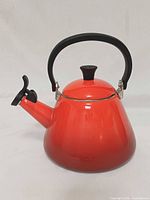 Front view of orange Le Creuset Kone kettle