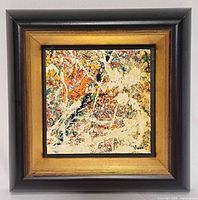 Front view of framed abstract painting