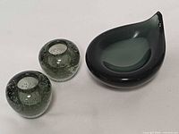 Group view of two bubbled candle holders and teardrop ashtray